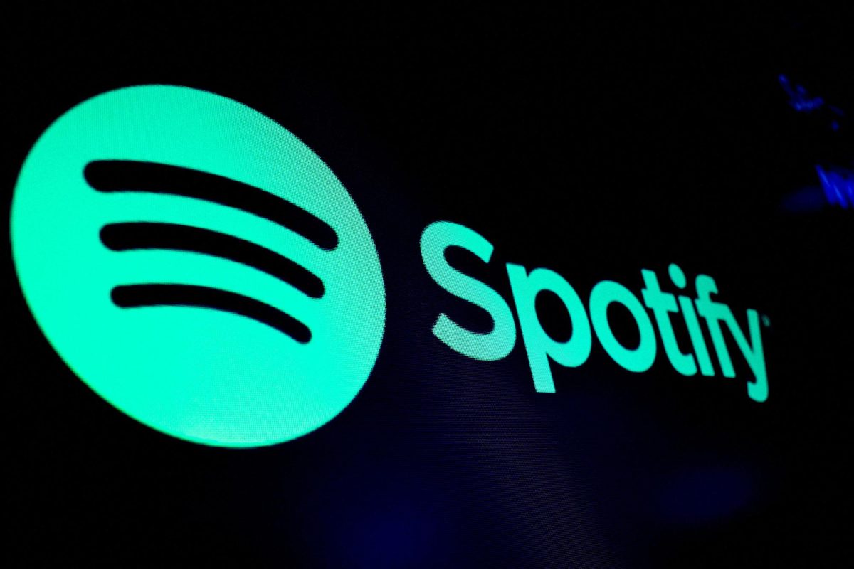 A screen displays the logo of Spotify on the floor at the New York Stock Exchange (NYSE.  REUTERS/Brendan McDermid