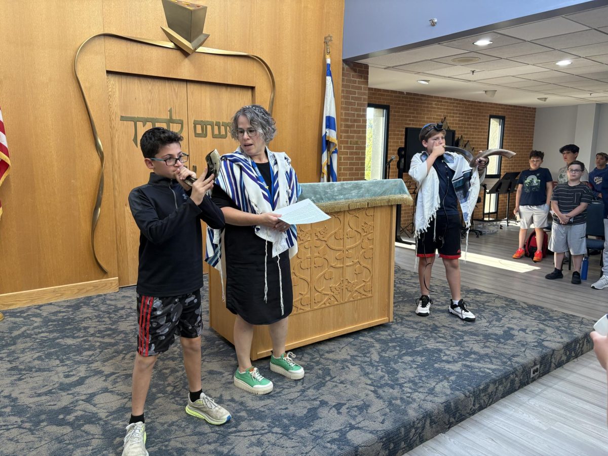 Rabbi Kalush helps students pray for days off.