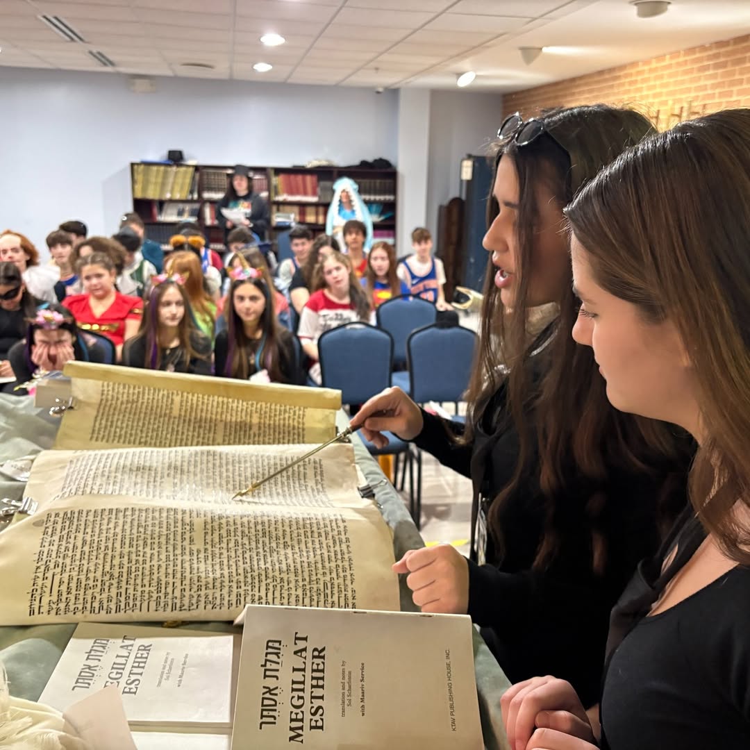 Annabella de Picciotto '29 and Tamar Ashkenazi '29 read from the Megillah on Purim, March 3rd, 2026